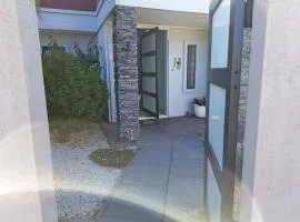 Two rooms with one queen size bed in each room one bathroom for the two rooms