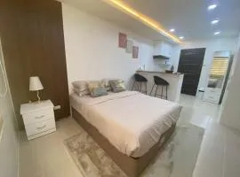 Llames Studios Near Mactan Airport - Rustic & Spacious