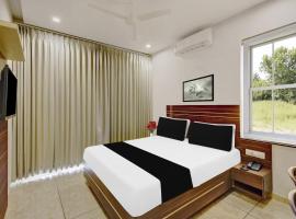 Super Townhouse Oak Dharwad formerly Rising Resort & Spa, hotel v destinaci Mugad