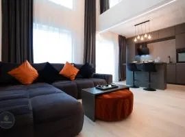 2 Level 1 Bedroom Lux Apartment with Balcony 75 Inch TV and Sofa Bed near Promenada Mall with High Ceilings Kitchen Washer and Work Space