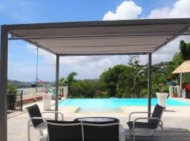 Maison avec vue sur la mer à La Trinité, piscine partagée