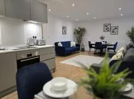 Snuggle Inn Serviced Apartments, Great choice for large groups, Contractors, Business Executives and Family Vacations in the stunning valley of Surrey Hills, secure Private Parking, Offering Easy Train Access to London, Gatwick airport, M25
