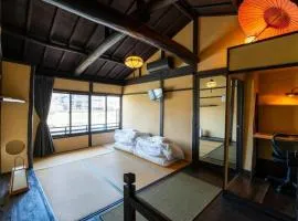 Kyoto Machiya inn offering scenic Kamo River views