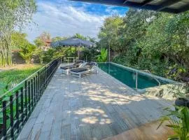 Private pool villa with rice field sunset views