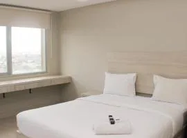 Cozy Studio at Gateway Park LRT City Jatibening Apartment By Travelio
