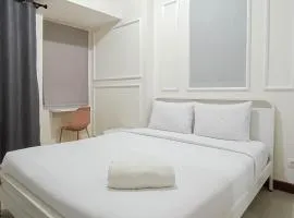 White and Cozy Studio at Vida View Makassar Apartment By Travelio