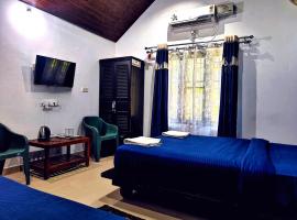 Twin Cottages Resort Coorg, guest house in Madikeri
