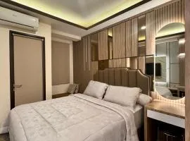 Apartement Trans Park Cibubur By Raya Property with Pool View & Netflix