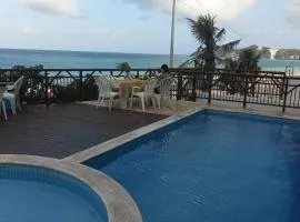 Flat Pé na areia