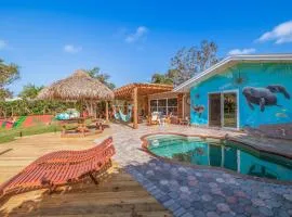 Paradise Cove Waterfront Pool Spa Dolphins Manatees Canoes