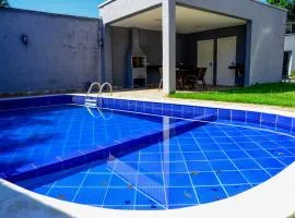Casa a 150m da Praia de Boicucanga com piscina