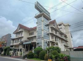 Viesnīca Hotel Surya Asia pilsētā Ngasinan