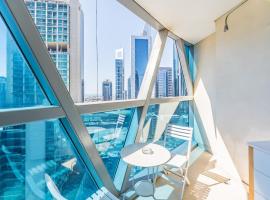 Luxury Spacious Condo in the Iconic Park Towers, acomoda&ccedil;&atilde;o em condom&iacute;nio em Dubai