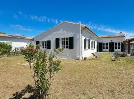 Superbe villa à deux pas des commerces avec jardin