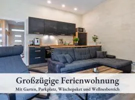 Familienfreundliche Ferienwohnung mit großem Garten, Spielplatz, privatem Badefass & Sauna