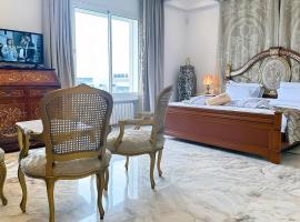 L'Orchidée - Suites de Luxe avec Piscine Chauffée et Vue sur le Lac de Tunis, hotel a Tunisi