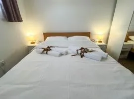 Apartmani Moslavina, free big parking, workspace, crib, satin cotton sheets