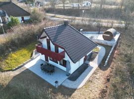 Haus 99, Dorf 3 mit Sauna & Whirlpool, hotel na praia em Kirchheim