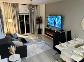 New Apt near the beach Airport restaurants mall