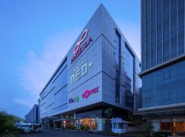 Hotel Neo Plus Airport Jakarta, отель рядом с аэропортом Аэропорт Сукарно-Хатта - CGK в городе Тангеранг