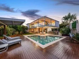 Luxury 5-Bedroom Canal-Front Retreat in Mooloolaba