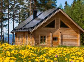 Blockhaus am See - Komfort umgeben von Natur!, hotel de playa en N&auml;lden