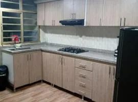 Habitación con parqueadero