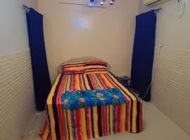 Fully Furnished bedroom with shared bathroom in a villa sharjah