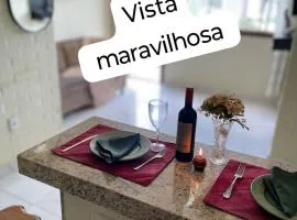 Flat com vista espetacular 2 banheiros 3 quartos área central-cozinha completa-AR- casais - grupos ou familias ou empresas