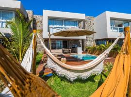 Casa pé na areia em Milagres: Naluum Residence、Barra do Camaragibeのホテル