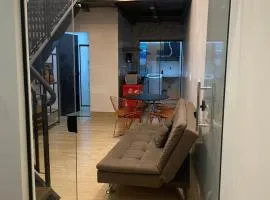 Loft sofisticado e bem localizado