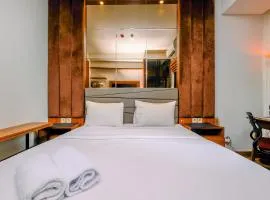 Minimalist Studio Room at Transpark Cibubur Apartment near Shopping Center By Travelio