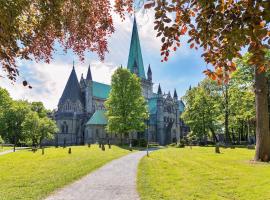 Du vil elske &aring; bo her! Et lite, men koselig sted med perfekt beliggenhet!: Trondheim şehrinde bir kendin pişir kendin ye tesisi