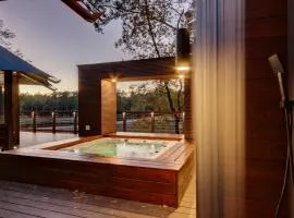 The Covery the Wren House a luxury African tent retreat on stocked bass pond