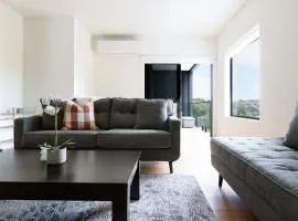Modern Getaway with Balcony & Secure Parking