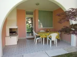 Spacious apartment with terrace and pool in Bibione