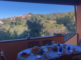Andrea Frau - Casa Mandorleto new - Sardinia Villasimius-Peaceful Panoramic Terrace-full comfort air conditioning-WiFi-Parking-Privacy, hotel in Villasimius
