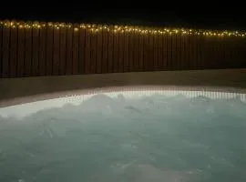 Self contained guest suite with hot tub in private part of house, own entrance