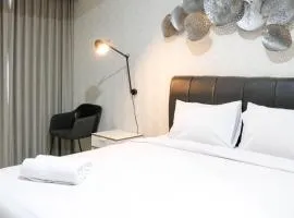 Elegant and Best Choice Studio at Grand Sungkono Lagoon Apartment By Travelio