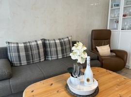 Ferienwohnung Buhne 33, hotell sihtkohas Hooksiel