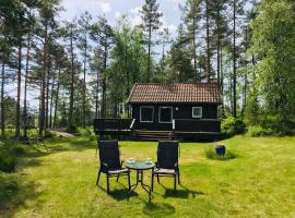 Fredelig og landlig hytte，Iveland的露營地