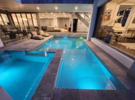 Red Sands Retreat, hotel with hot tubs in Shellharbour