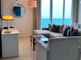 Breathtaking Direct Bay Views 2 bedroom condo with parking