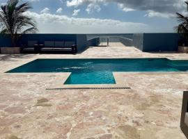 The Cave Beach House, hotel v destinaci Lagun