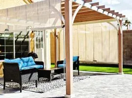 Near the Strip, Smart TVs, WiFi, private garage and backyard