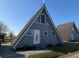 Nurdachhaus mit Blick ins Grüne- ruhige Lage nahe Yachthafen Fedderwardersiel, Hotel in Fedderwardersiel