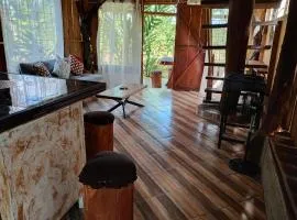 su cabaña Río Celeste