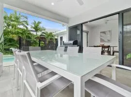 Coastal Comfort Palm Cove with Heated Pool