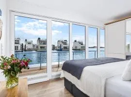 5 Beaufort - Wasserhaus, Meerblick, Sauna, Dachterrasse, Bootsanleger, Strandkorb