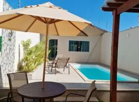 Ivana Imoveis - Casa com Piscina na Praia do Morro á 2 minutos da praia